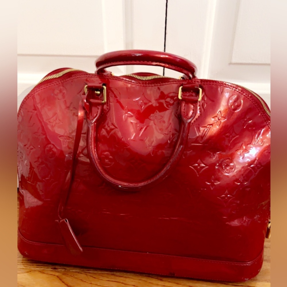 Red Louis Vuitton bag
